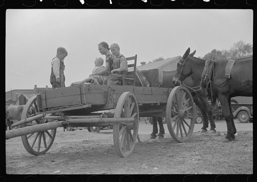 Untitled photo, possibly related to: Farmer's family waiting to go home on Saturday afternoon. Enterprise, Alabama