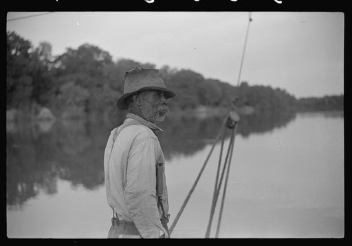 Untitled photo, possibly related to: Negro almost eighty, who has been running ferry across river from Camden to Gee's Bend for almost forty-eight years. Gees Bend, Alabama