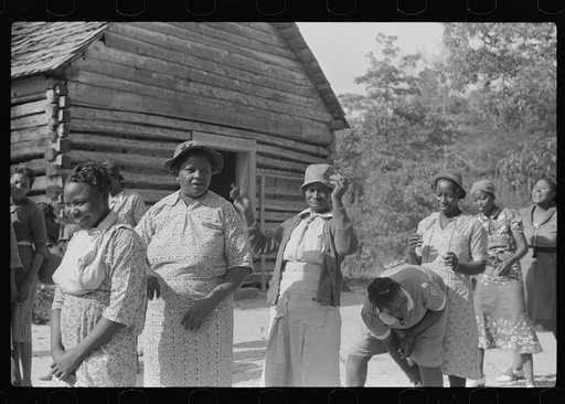 Untitled photo, possibly related to: Florence Wright, recreation supervisor, directs games with adult class. Gees Bend, Alabama