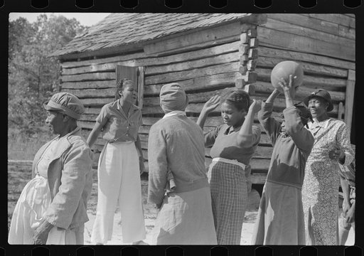Florence Wright, recreation supervisor, directs games with adult class. Gees Bend, Alabama