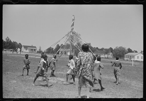 Rehearsing the maypole dance for May Day, health day excercises. Gees Bend, Alabama