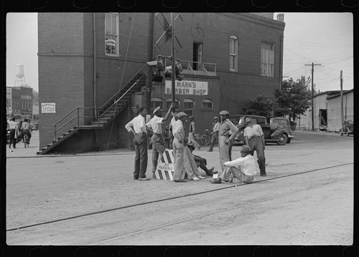 Hanging around railroad tracks in center of town of Fitzgerald, Georgia