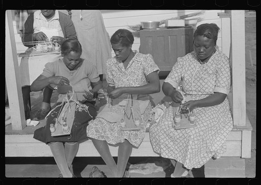 Home economics and home management class for adults under supervision of Evelyn M. Driver. Everything they make, including the hand looms, utilizes materials of local origin such as bamboo, cane, cornshucks, flour and meal and feed sacks, etc. Flint River Farms, Georgia