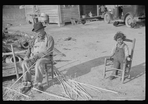 Untitled photo, possibly related to: Mixed-breed Indian, white and Negro, near Pembroke Farms, making new chair seat. North Carolina