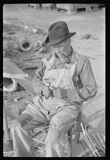 Untitled photo, possibly related to: Mixed-breed Indian, white and Negro, near Pembroke Farms, making new chair seat. North Carolina