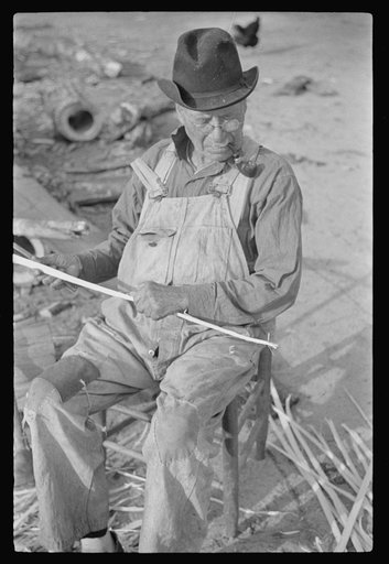 Untitled photo, possibly related to: Mixed-breed Indian, white and Negro, near Pembroke Farms, making new chair seat. North Carolina