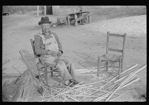 Untitled photo, possibly related to: Mixed-breed Indian, white and Negro, near Pembroke Farms, making new chair seat. North Carolina