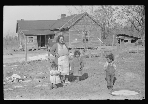 Untitled photo, possibly related to: Mixed-breed Indian family, white and Negro, looking at location for new farmhouse near Pembroke Farms, North Carolina
