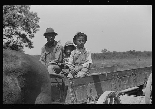 Untitled photo, possibly related to: Project family in new wagon, Flint River Farms, Georgia