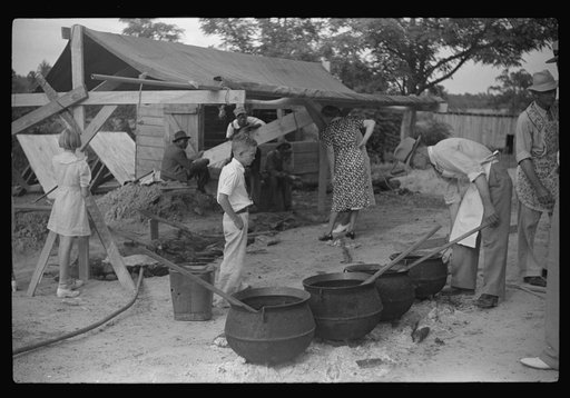 Untitled photo, possibly related to: Barbeque picnic on the occasion of the dedication of a FSA (Farm Security Administration) building, Greene County, Georgia