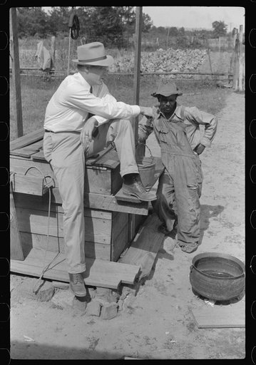 Untitled photo, possibly related to: FSA (Farm Security Administration) supervisor inspecting rehabilitation borrower's well. Greene County, Georgia