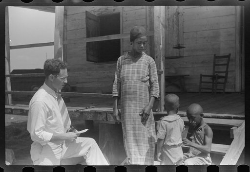 Untitled photo, possibly related to: Public health doctor giving tenant family medicine for malaria, near Columbia, South Carolina