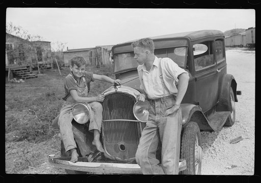 Migrant laborer's family near Canal Point packinghouse, Florida