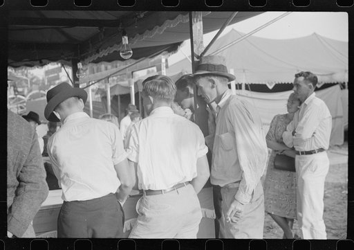 Untitled photo, possibly related to: Migratory packinghouse workers waiting around post office during slack season. Belle Grande, Florida