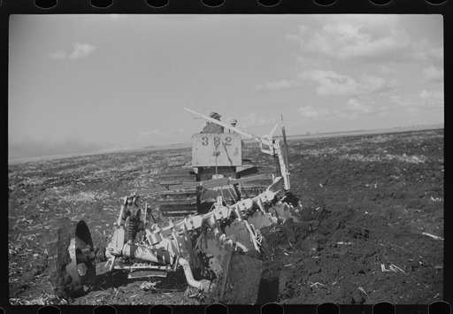 Untitled photo, possibly related to: Discing the black mulch land before planting sugarcane for United States Sugar Corporation near Clewistown, Florida