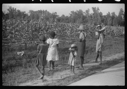 Untitled photo, possibly related to: Pauline Clyburn's children, rehabilitation borrowers, coming out of field, Manning, Clarendon County, South Carolina