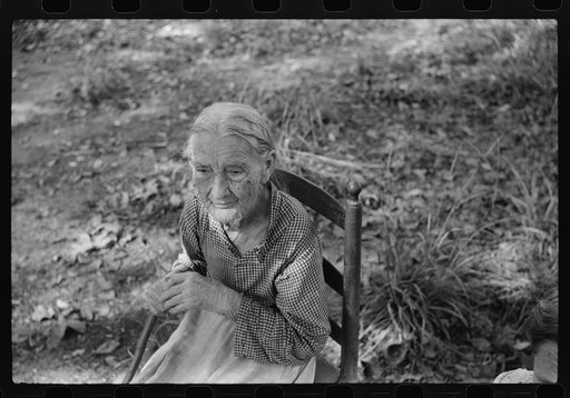Untitled photo, possibly related to: Mrs. Lloyd, ninety-one year old mother of Miss Nettie Lloyd, who is a pellagra victim. Mrs. Lloyd was born and reared in Orange County; has lived on this spot since her marriage sixty-nine years ago. It is on a new road leading off from left of Route number 54, a