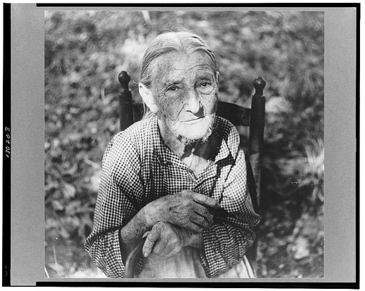 Mrs. Lloyd, ninety-one year old mother of Miss Nettie Lloyd, who is a pellagra victim. Mrs. Lloyd was born and reared in Orange County; has lived on this spot since her marriage sixty-nine years ago. It is on a new road leading off from left of Route number 54, about four miles west of Carrboro, Ora