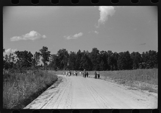 Untitled photo, possibly related to: Negro children walking home from school near Frogsboro, Caswell County, North Carolina