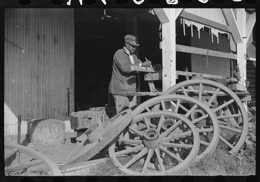 Uncle George who has worked in the blacksmith and carpentry shop on Marcella Plantation ever since he left prison fifty years ago. Mileston, Mississippi Delta, Mississippi