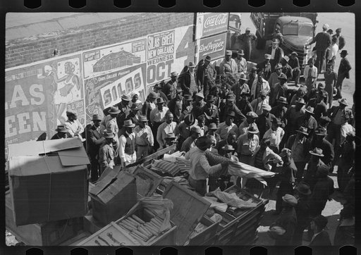 Untitled photo, possibly related to: Itinerant salesman selling goods from his truck to Negroes in center of town on Saturday afternoon. Belzoni, Mississippi Delta, Mississippi