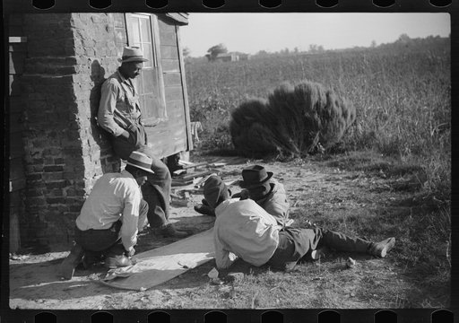 Untitled photo, possibly related to: Negroes shooting craps behind tenant house, disposing of their cotton money on Saturday afternoon, Marcella Plantation, Mississippi Delta, Mississippi