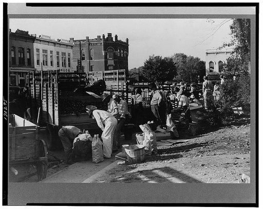 Selling apples on main street on Saturday afternoon, Lexington, Mississippi Delta, Mississippi