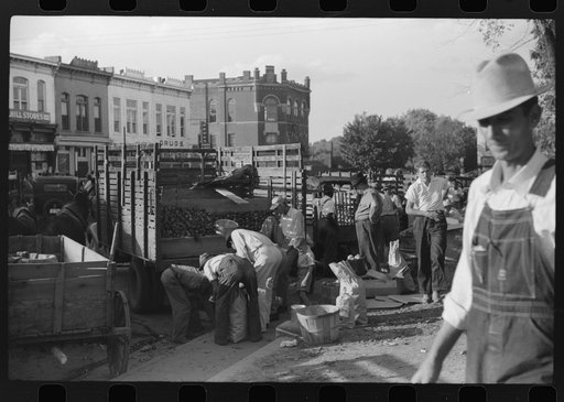 Untitled photo, possibly related to: Selling apples on main street on Saturday afternoon, Lexington, Mississippi Delta, Mississippi
