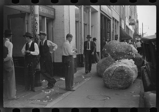 Untitled photo, possibly related to: Cotton "snakes," waste cotton picked from floors of sampling and classing rooms in brokers' offices on Cotton Row, Front Street, Memphis, Tennessee