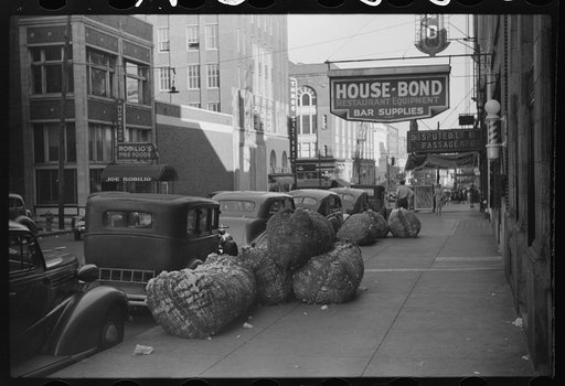 Untitled photo, possibly related to: Cotton "snakes," waste cotton picked from floors of sampling and classing rooms in brokers' offices on Cotton Row, Front Street, Memphis, Tennessee