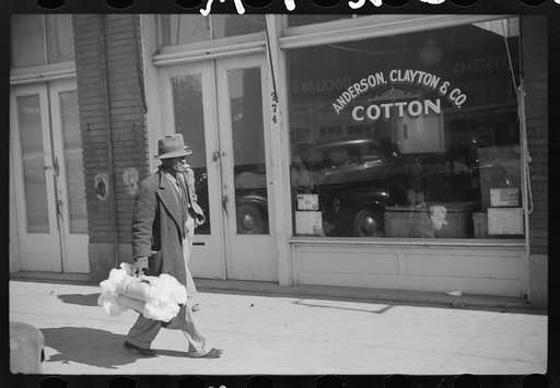 Negro farmers bringing samples of cotton to sell in brokers' offices. Clarksdale, Mississippi Delta, Mississippi