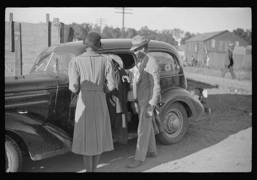 Untitled photo, possibly related to: Used car lot, Clarksdale, Mississippi Delta, Mississippi. Big sales go on after cotton picking season to get the money cotton pickers have made. Many of the pickers buy new or used cars with their cotton money