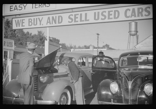 Untitled photo, possibly related to: Used car lot, Clarksdale, Mississippi Delta, Mississippi. Big sales go on after cotton picking season to get the money the cotton pickers have made. Many of the pickers buy new or used cars with their cotton money