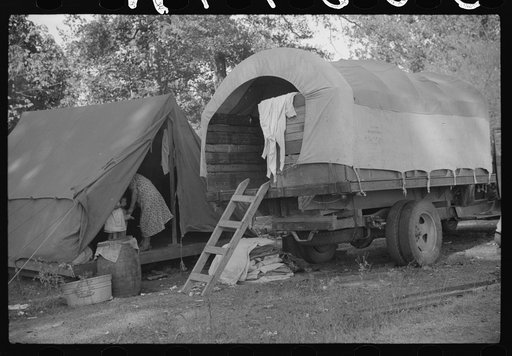 Untitled photo, possibly related to: Tents of Mexican labor brought from Texas by contractor for the duration of cotton picking season. Hopson Plantation, near Clarksdale, Mississippi Delta, Mississippi
