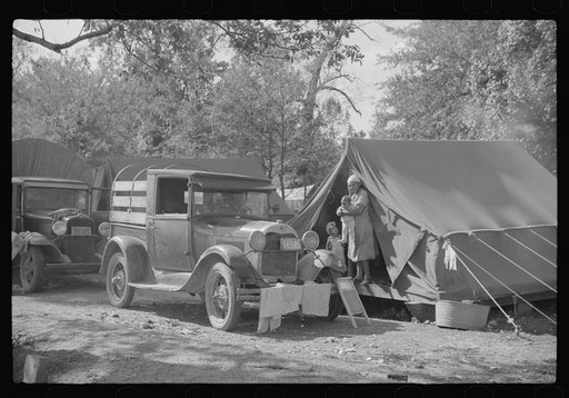 Untitled photo, possibly related to: Tents of Mexican labor brought from Texas by contractor for the duration of cotton picking season. Hopson Plantation, near Clarksdale, Mississippi Delta, Mississippi