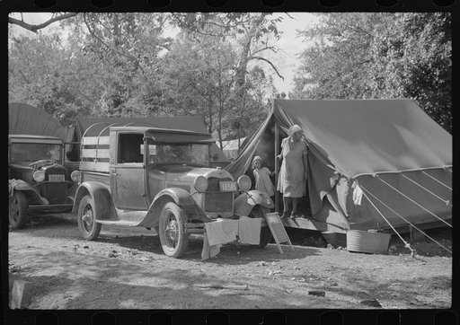 Tents of Mexican labor brought from Texas by contractor for the duration of cotton picking season. Hopson Plantation, near Clarksdale, Mississippi Delta, Mississippi
