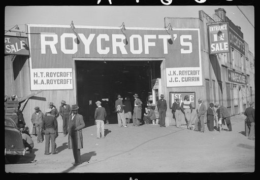 Untitled photo, possibly related to: Entrance to tobacco warehouse during auction sales. Durham, North Carolina