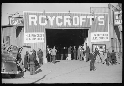 Entrance to tobacco warehouse during auction sales. Durham, North Carolina