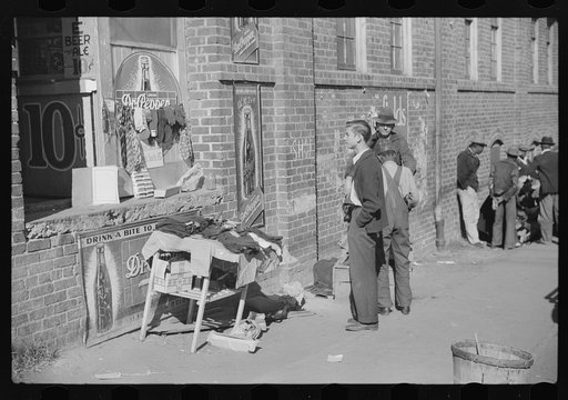 Untitled photo, possibly related to: Selling socks and neckties outside tobacco warehouse, Durham, North Carolina