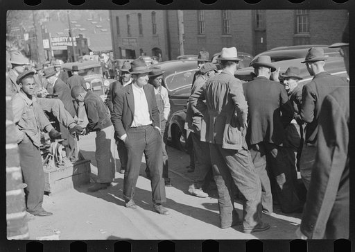 Untitled photo, possibly related to: Crowds outside tobacco warehouse, Durham, North Carolina