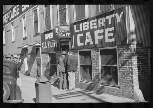 Untitled photo, possibly related to: Most tobacco warehouses have the cafe open all day and night under the warehouse. Durham, North Carolina