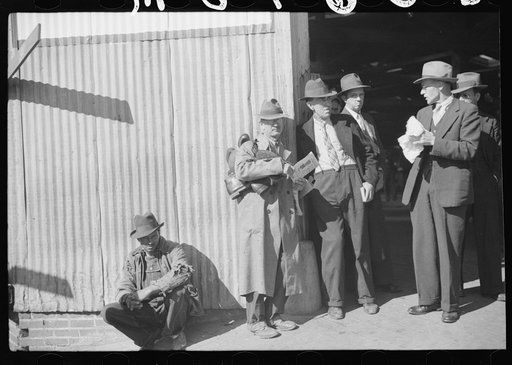Selling shoes outside tobacco warehouse during auction sales, Durham, North Carolina