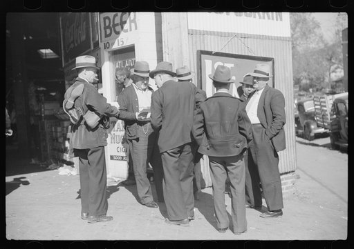 Selling shoes to farmers outside warehouse during tobacco auction, Durham, North Carolina