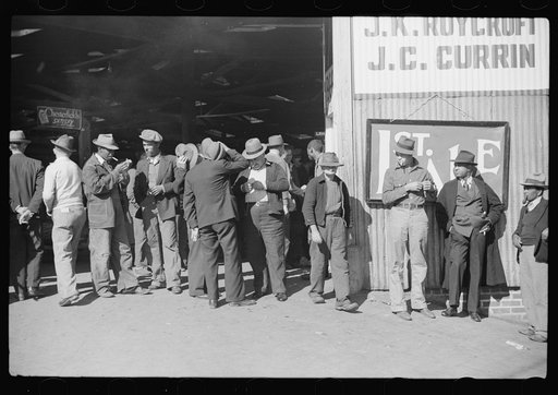 Untitled photo, possibly related to: Outside tobacco warehouse after auction sale. Durham, North Carolina