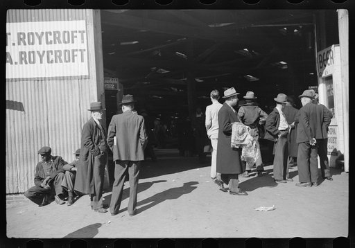 Selling scarves and table covers outside warehouse during tobacco auction, Durham, North Carolina