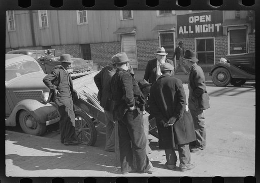 Untitled photo, possibly related to: Outside tobacco warehouse after auction sale. Durham, North Carolina