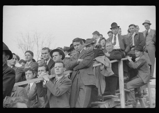 Untitled photo, possibly related to: Spectators at the Duke University-North Carolina football game. Durham, North Carolina
