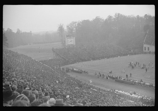 Untitled photo, possibly related to: Spectators at the Duke University-North Carolina football game. Durham, North Carolina