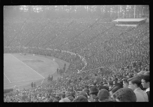 Untitled photo, possibly related to: Spectators at the Duke University-North Carolina football game. Durham, North Carolina