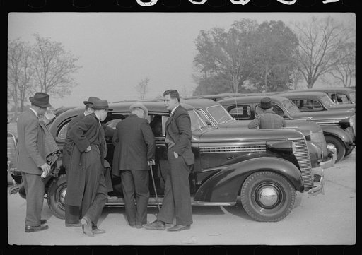 Untitled photo, possibly related to: Cars parked outside the stadium at the Duke University-North Carolina football game. Durham, North Carolina